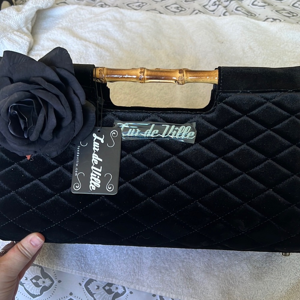 Brand new lux DeVille tiki purse